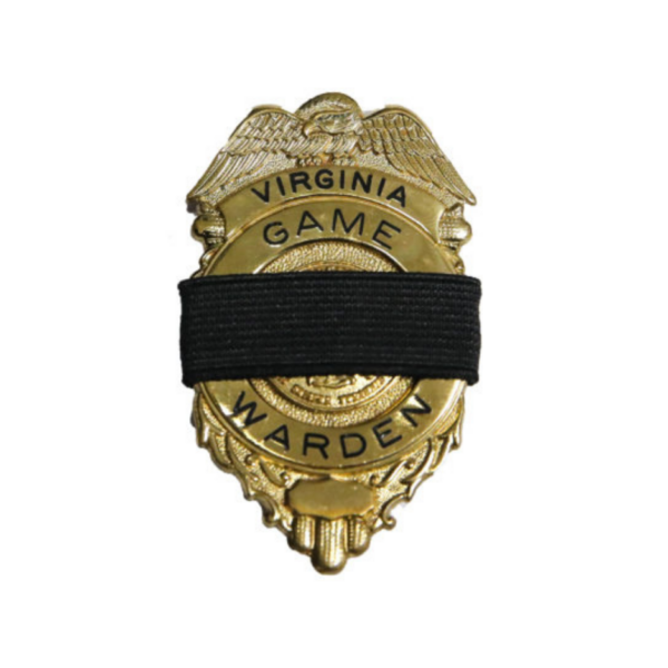 Isang gintong Virginia game warden badge.